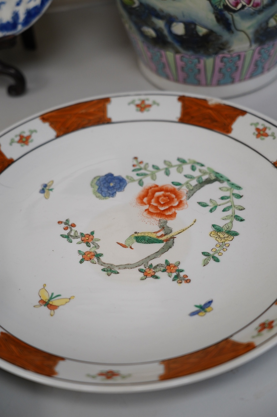 Oriental ceramics to include a Chinese yellow ground charger and a large famille noire vase, 47cm high (6). Condition - yellow charger chipped on rim, bird plate, glaze browned near centre, other four items good